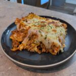 lasagna on black plate