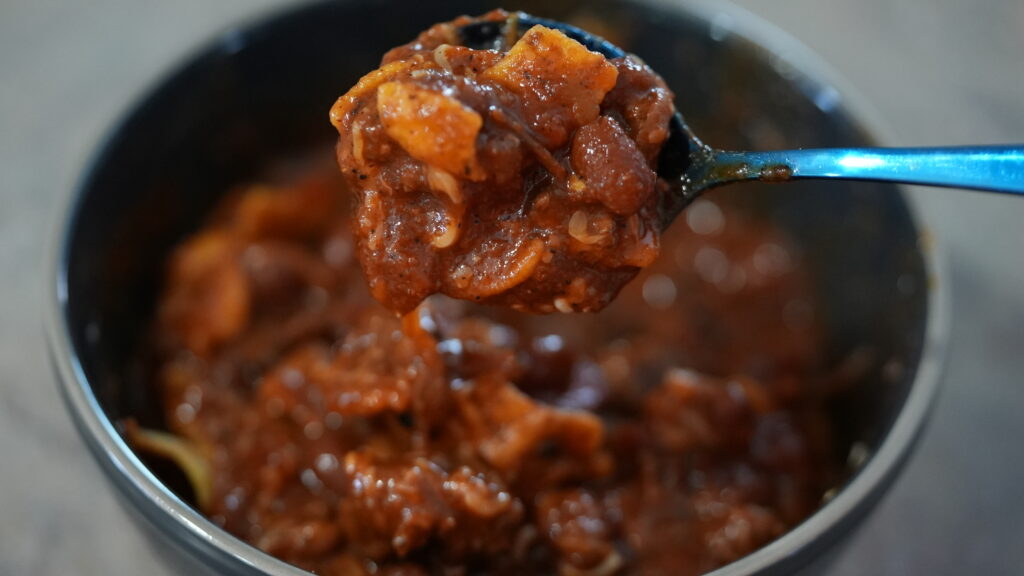 bowl of chili with Fritos in it