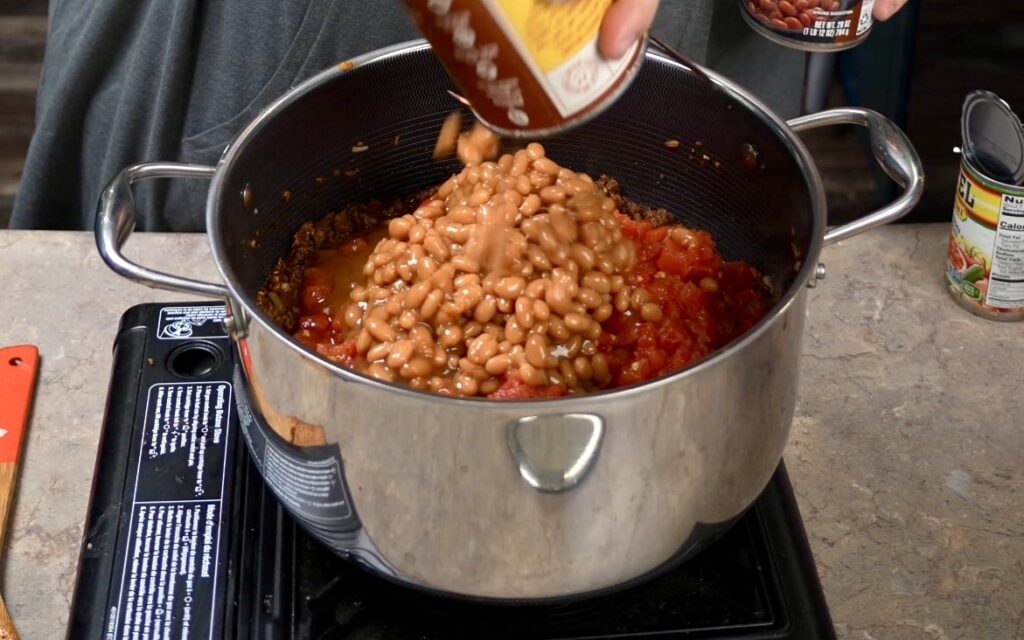 adding beans to chili