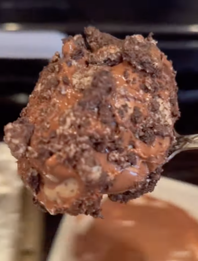 oreo bite on spoon
