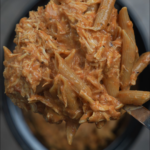 creamy chicken pasta on a spoon