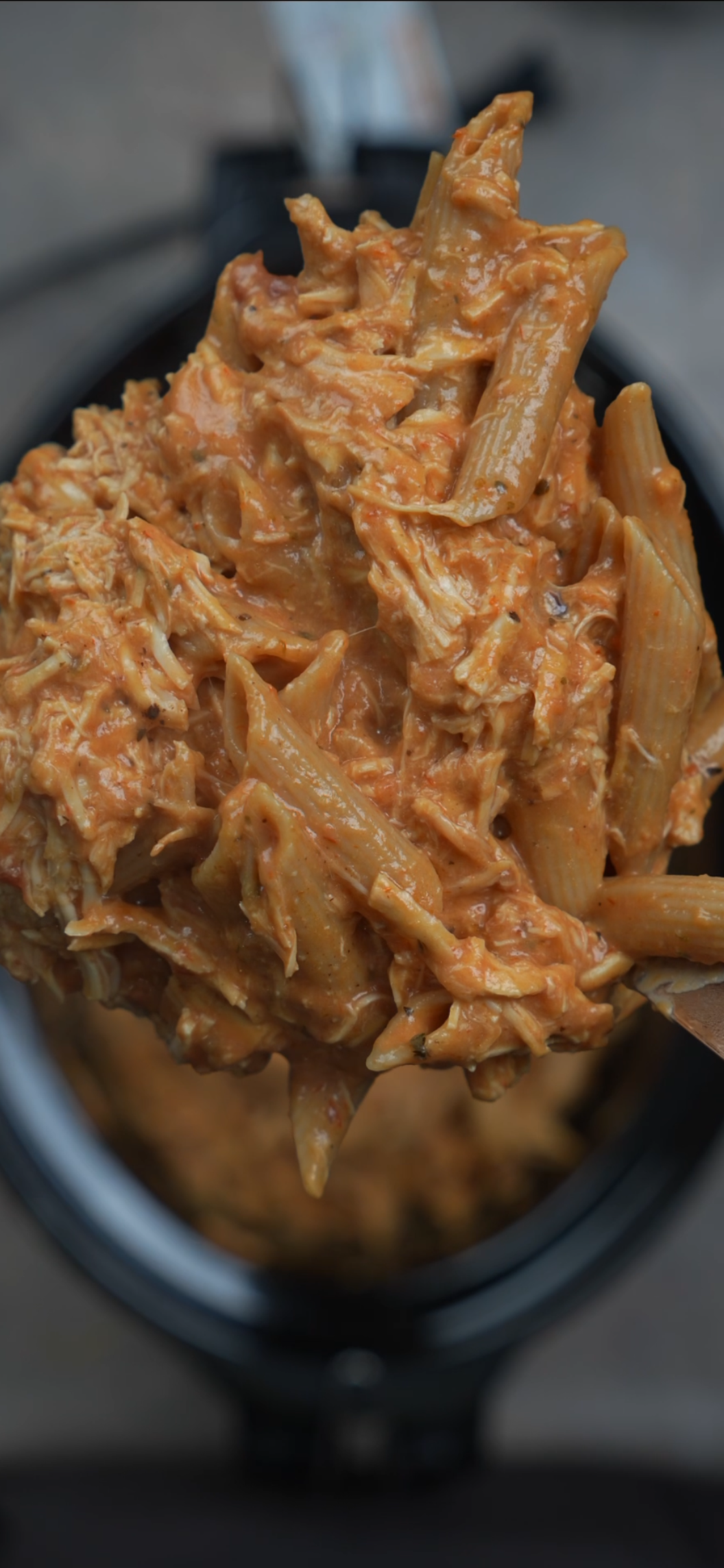creamy chicken pasta on a spoon