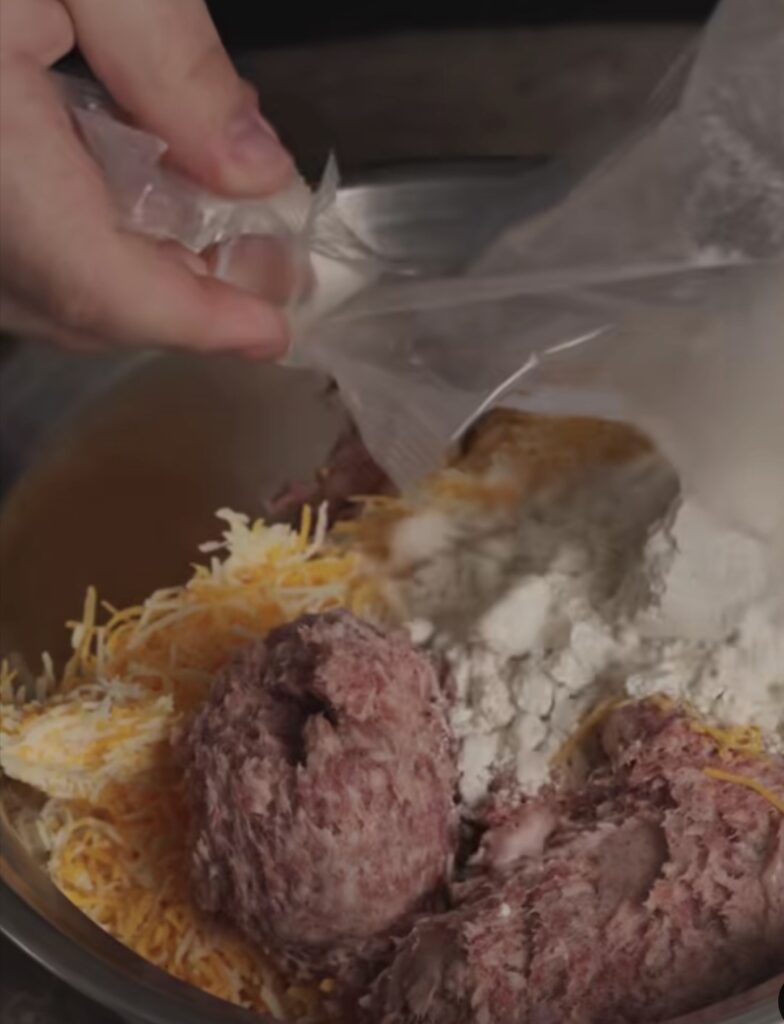 adding biscuit mix