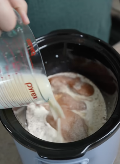 pouring ingredients into crock pot