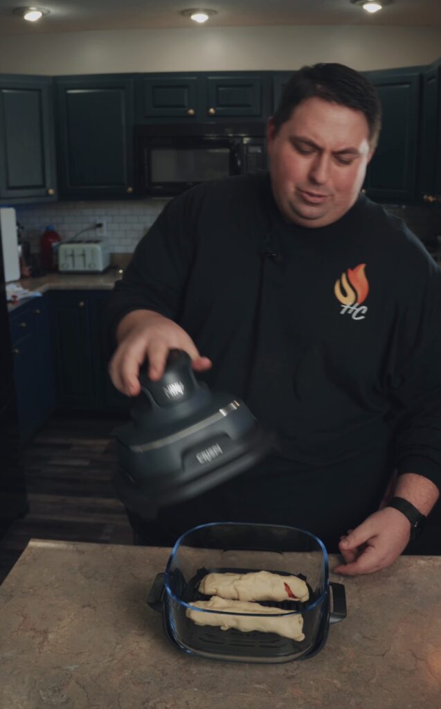 putting cheesy pizza stuffers in crispi fryer