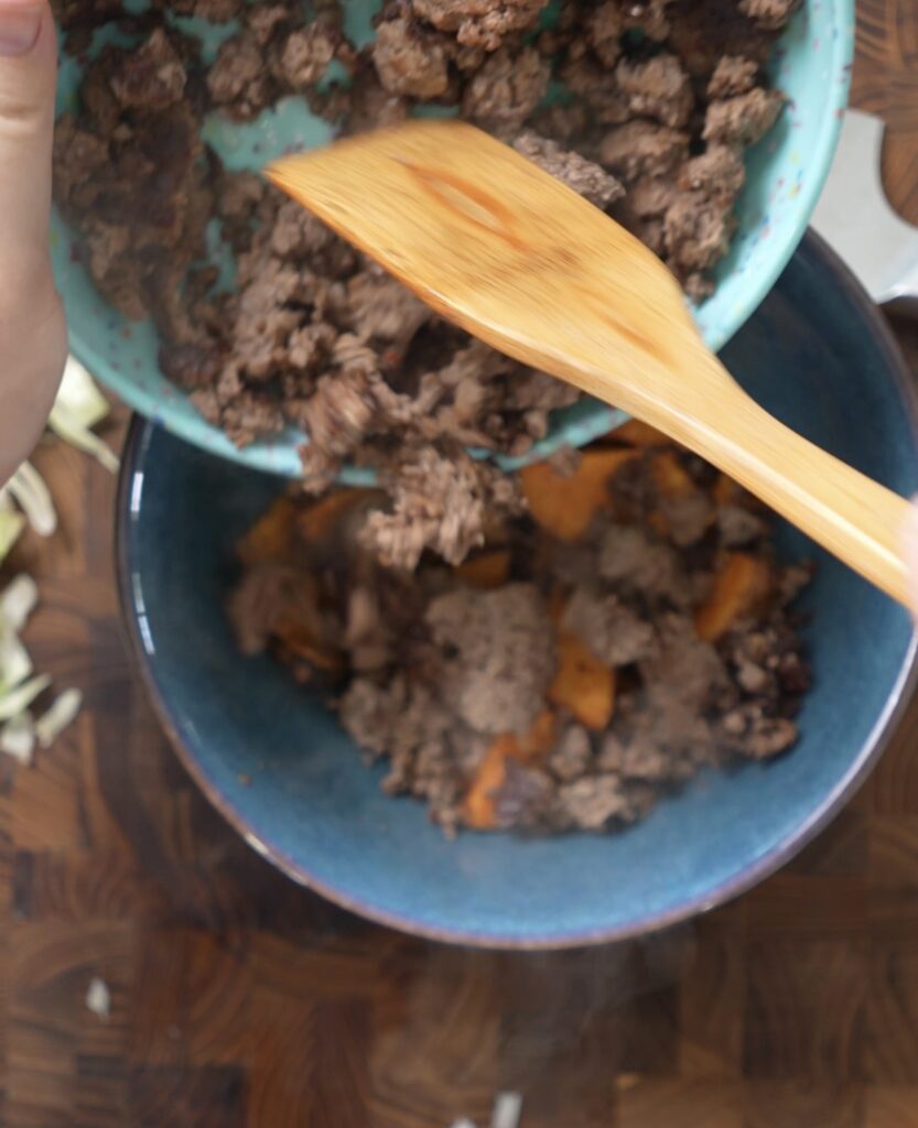 add hamburger to potatoes