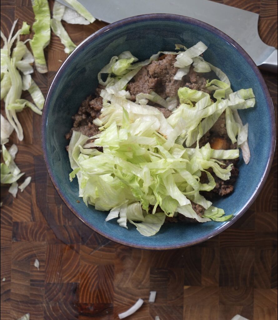 lettuce and hamburger in bowl