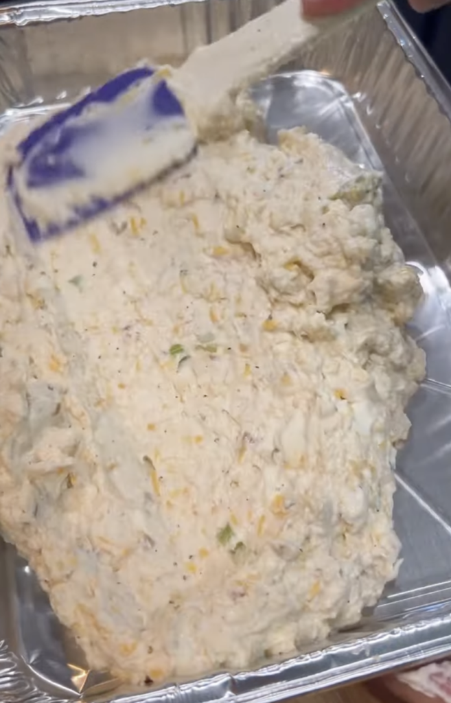 putting mixture into aluminum pan