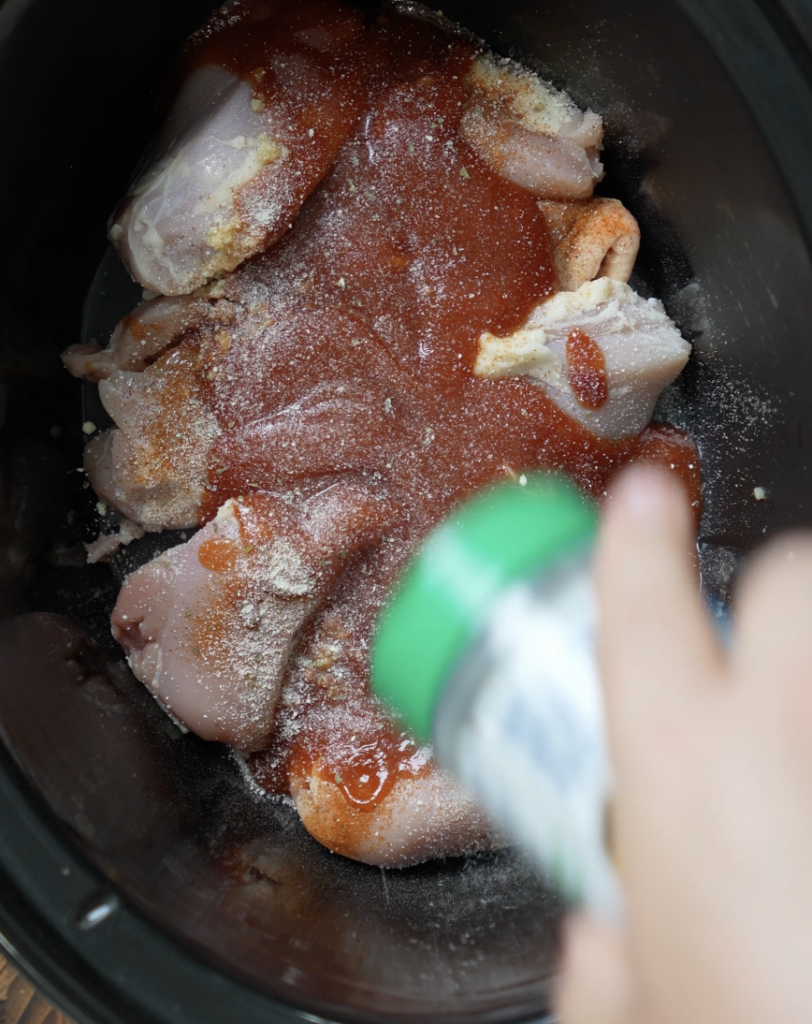 adding ranch seasoning to bbq chicken in crockpot