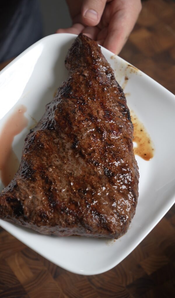 grilled steak on white plate