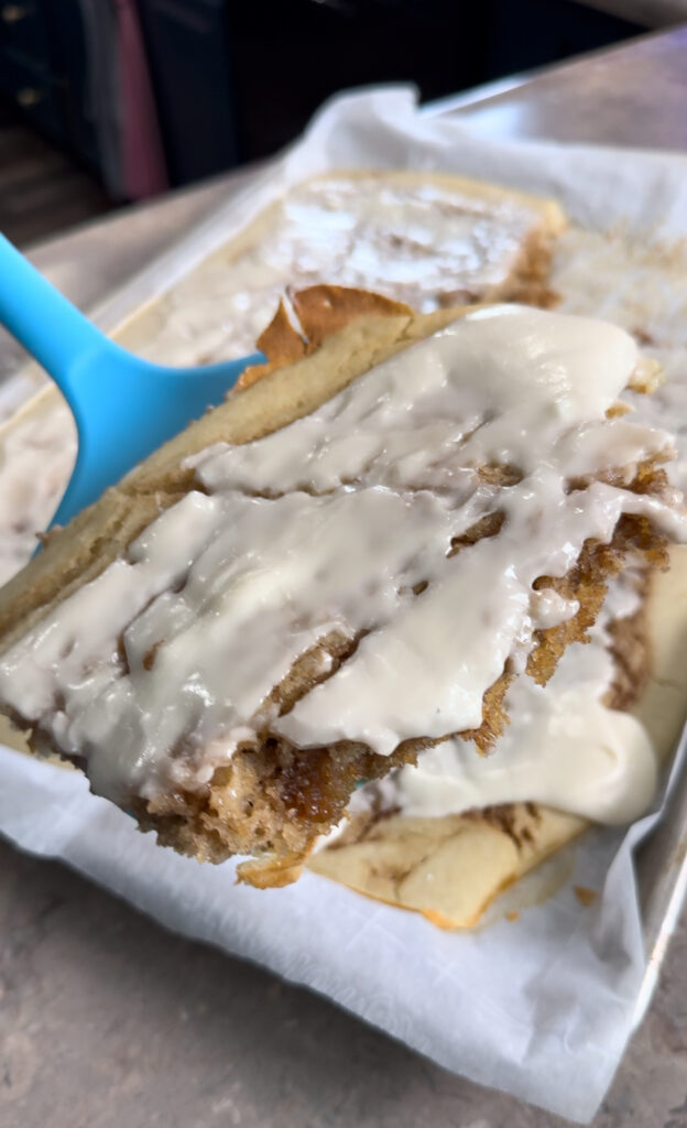 cinnamon roll flat cake on spatula