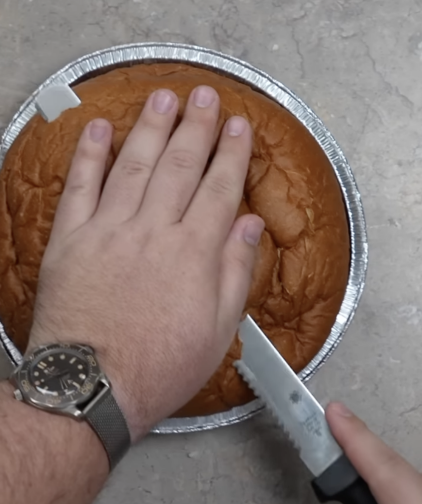 cutting top off bread bowl