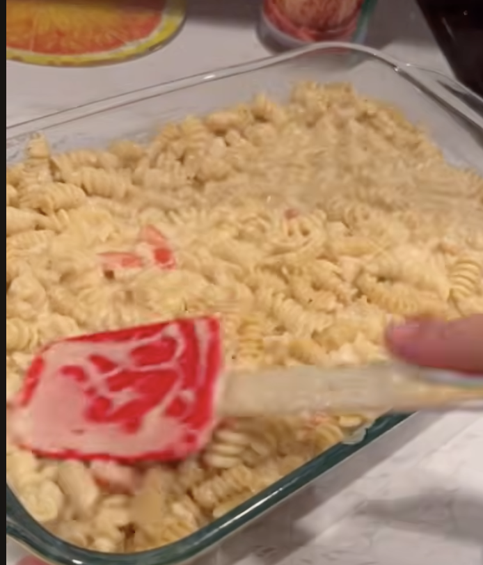 smoothing out the Alfredo bake