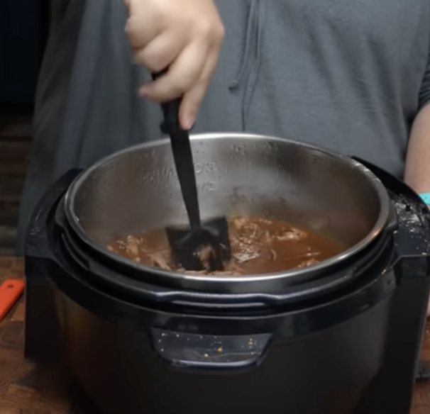 prepping meat in pot